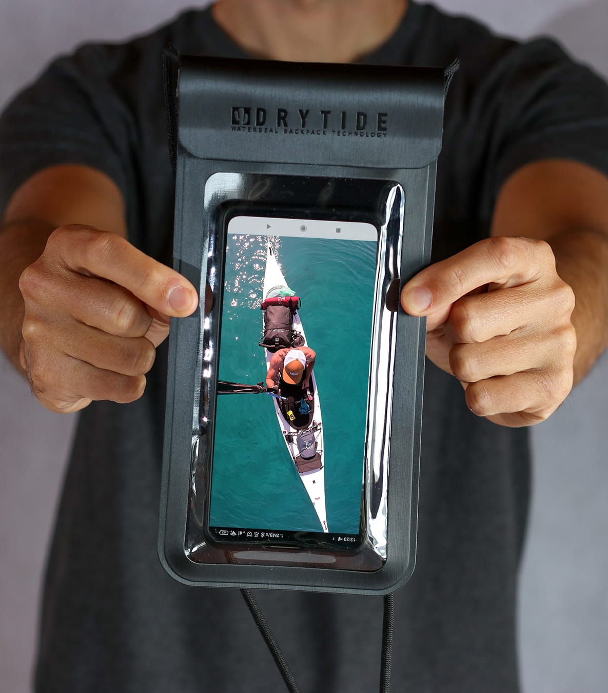 holding waterproof phone wallet