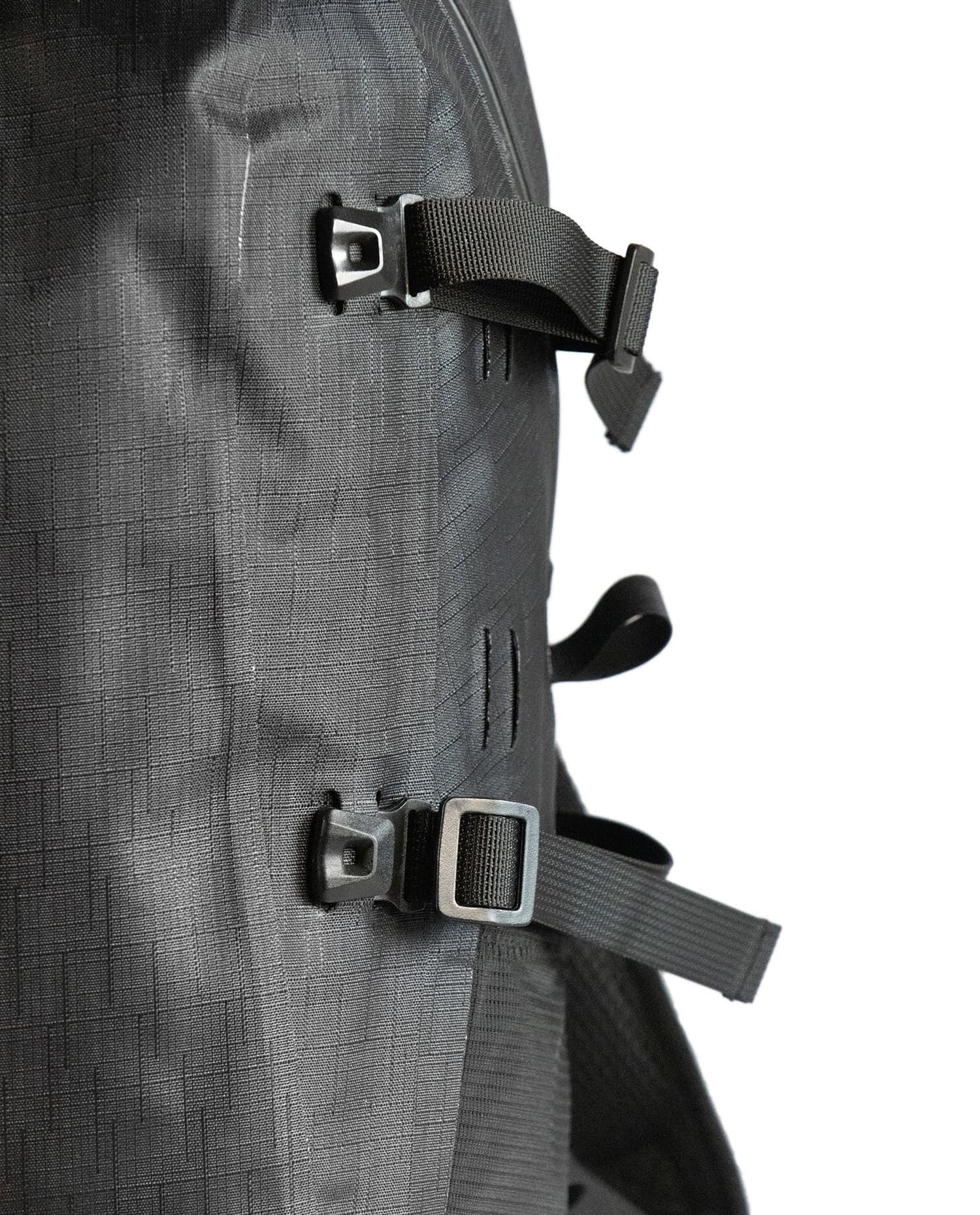 Close-up of Drytide waterproof backpack with secure buckle closures.