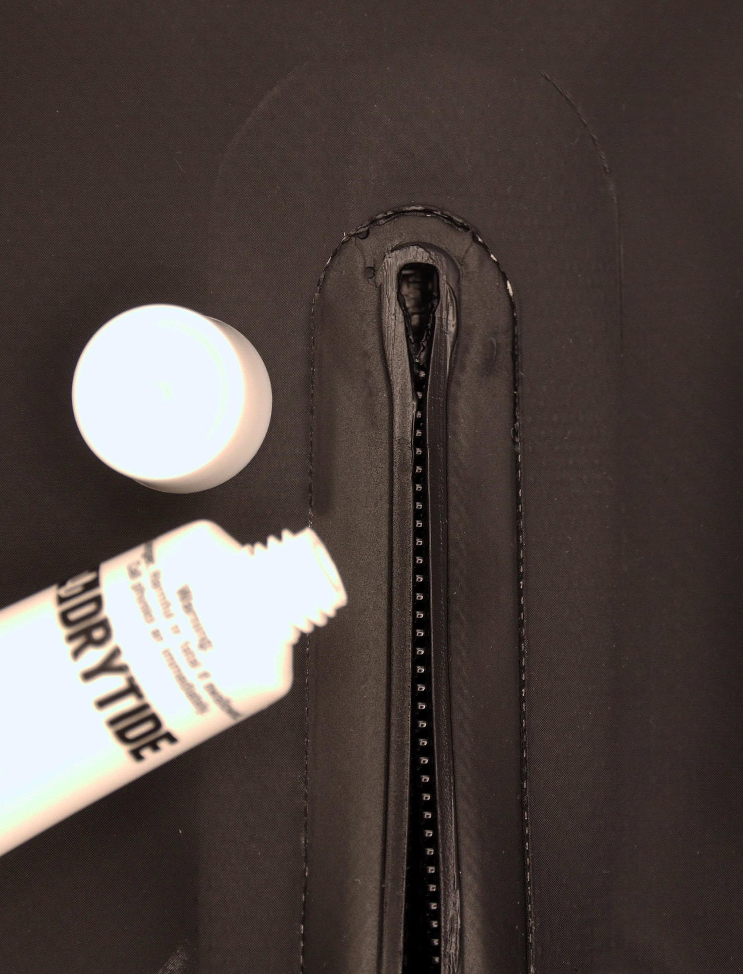 Waterproof gear storage bag with zipper for dry protection.