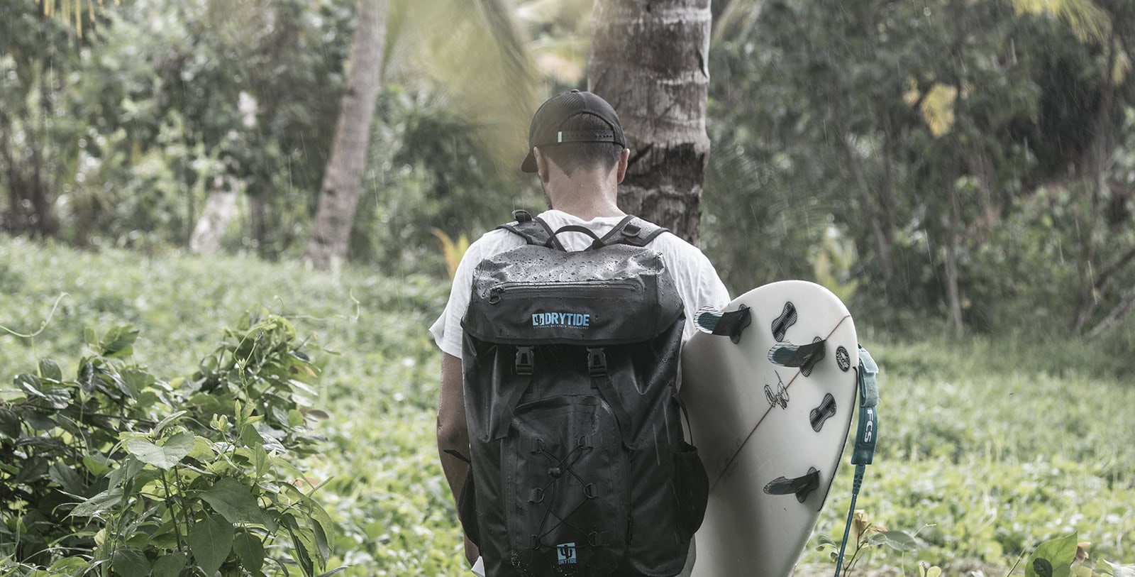surfer with waterproof backpack Surfer with a waterproof backpack