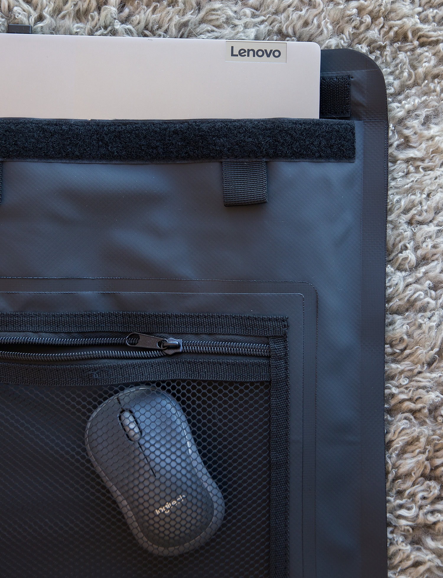 DryTide waperproof laptop sleeve with laptop and mouse