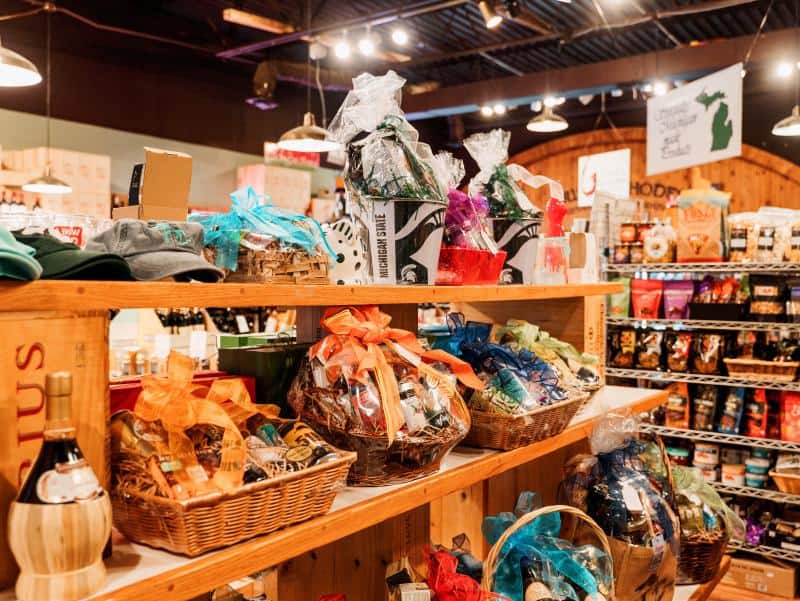 full shelf of gift baskets in dustys cellar