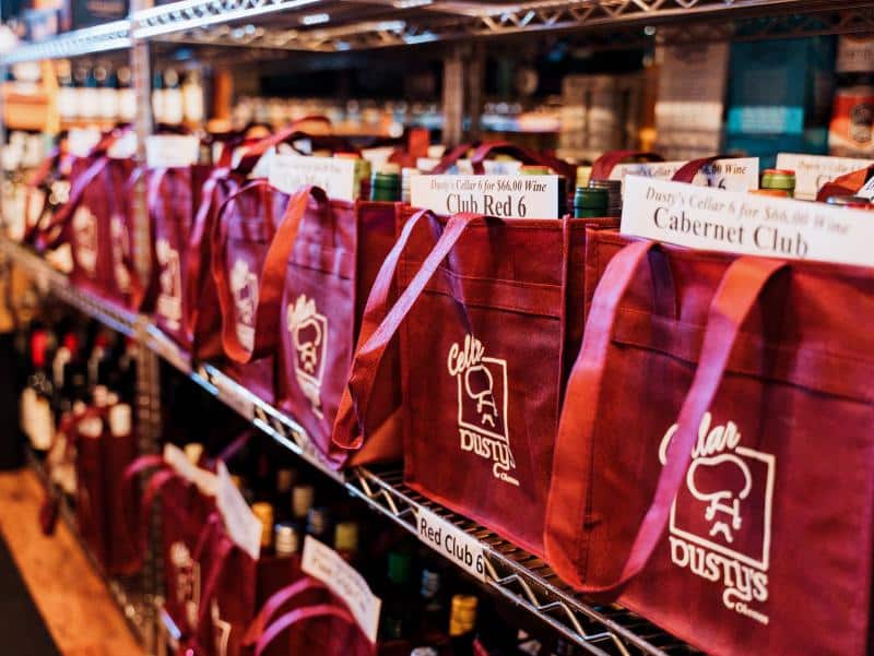 red win club bags on the shelf