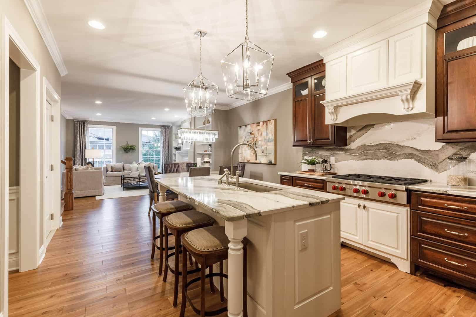 large kitchen with gas stove and double oven
