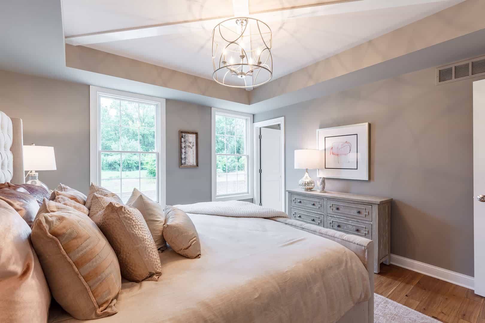 master bedroom with two windows