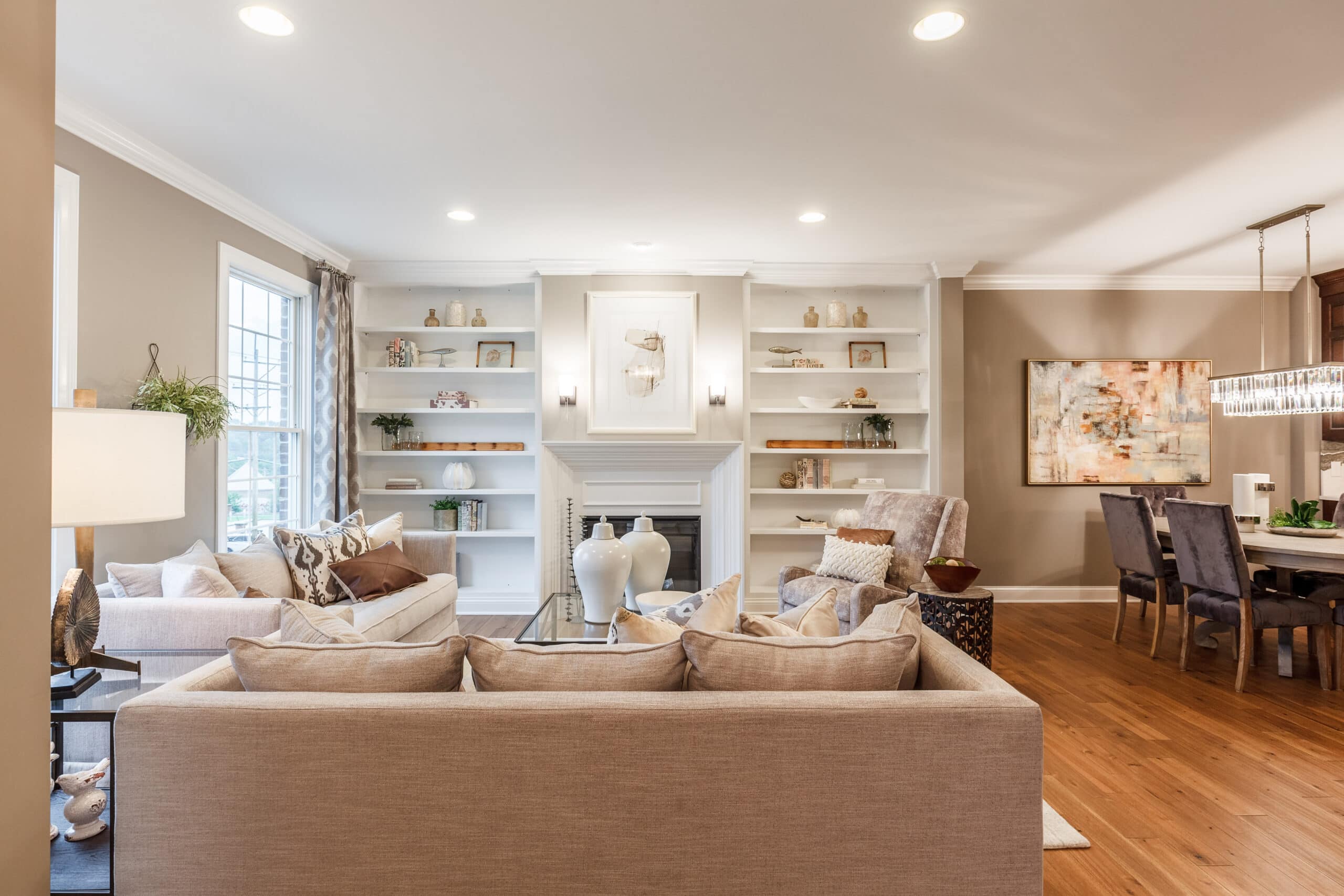 a living room with a fireplace and couches
