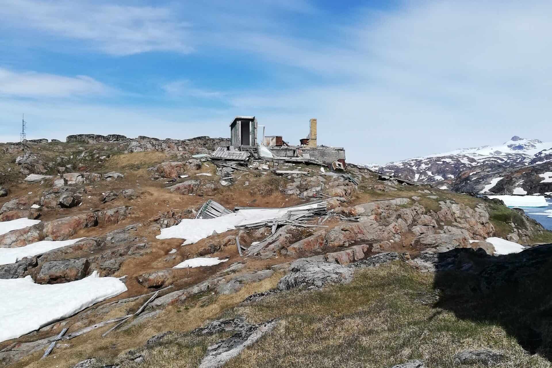 View of a house destroyed by a piteraq in the abandoned settlement Ikateq.