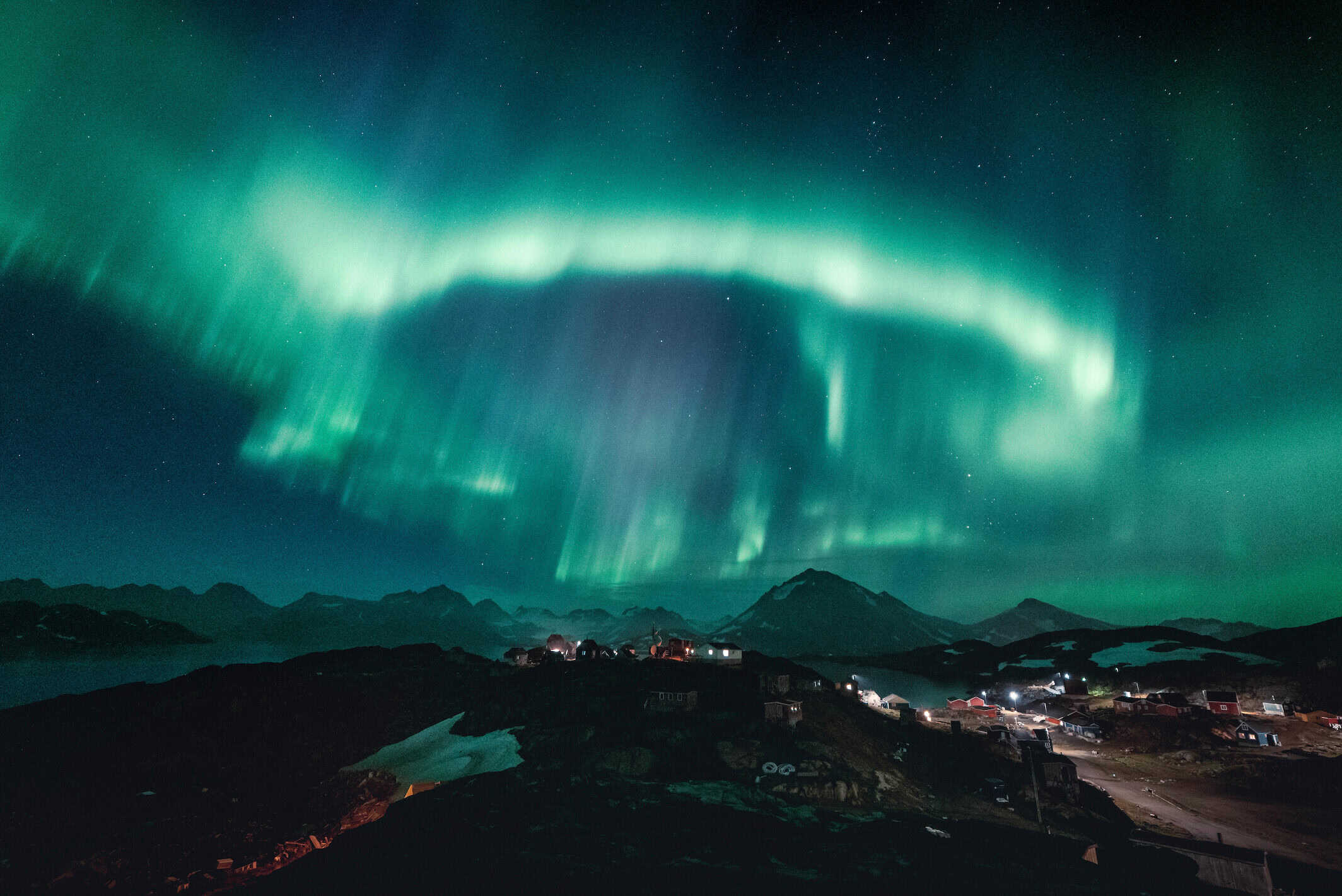 Northern sky disco over Kulusuk. Photo by Norris Niman - Visit Greenland