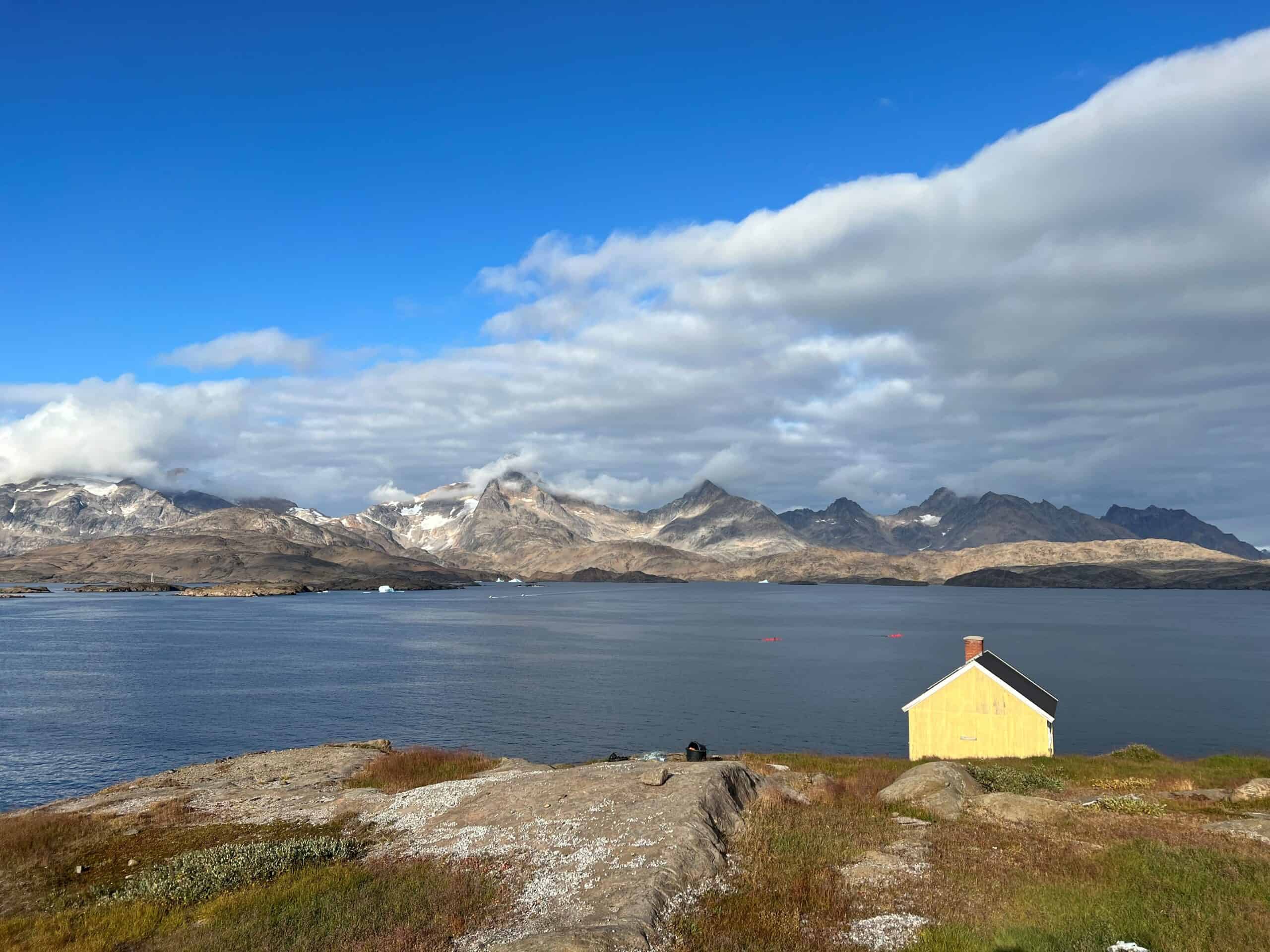 Two kayakers in the fjord of Tasiilaq.