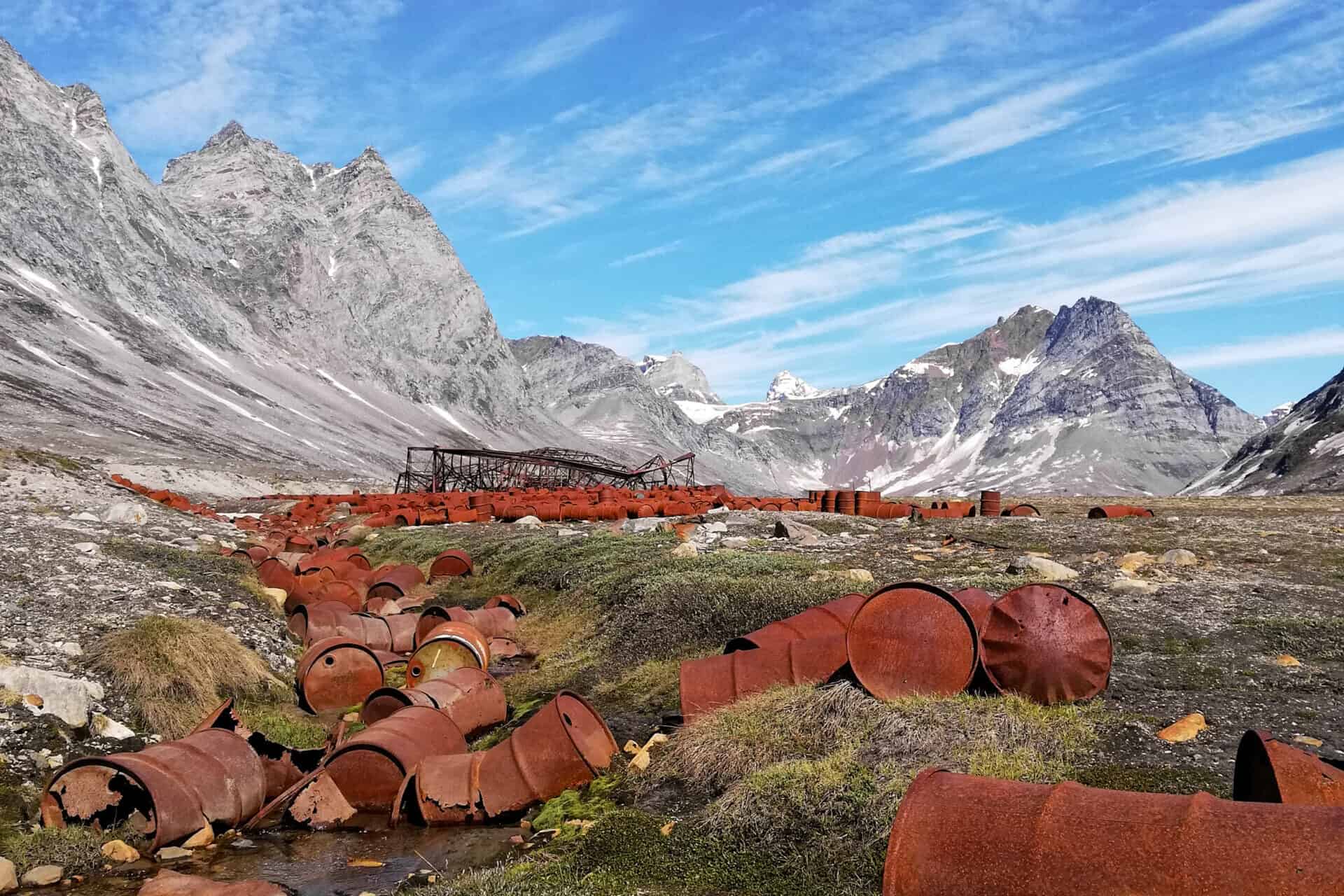 Remaining barrels at the abandoned Ikateq Airbase from WWII.