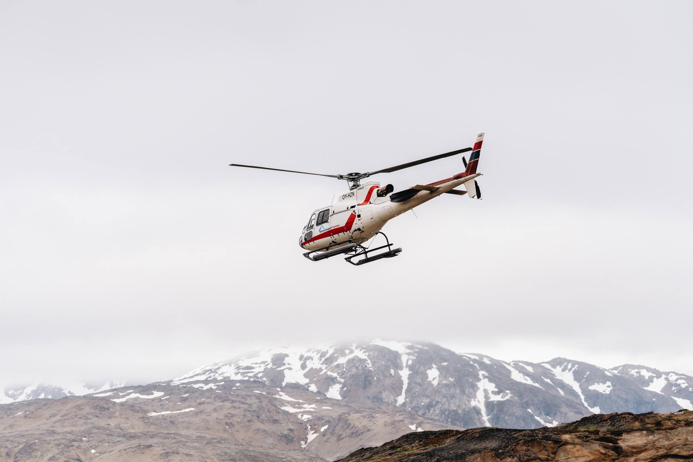 Helicopter flightseeing in East Greenland. Photo by Filip Gielda - Visit East Greenland