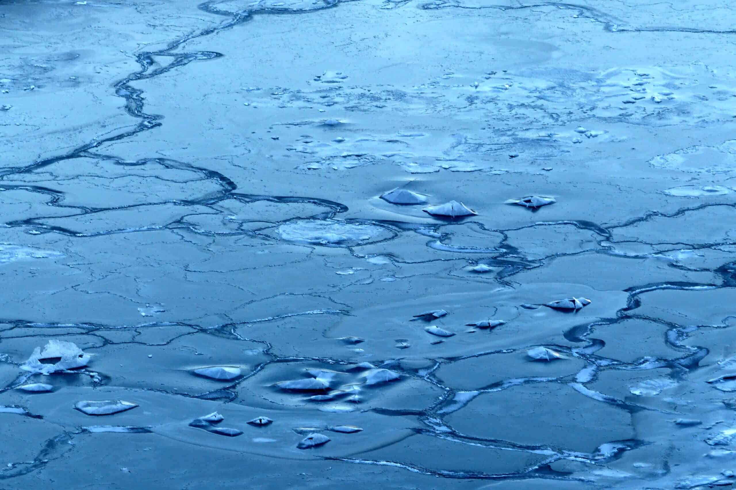Ice cracking that has build on the sea surface.