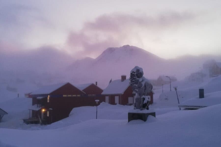 Piteraq storm approaching in Tasiilaq during winter.