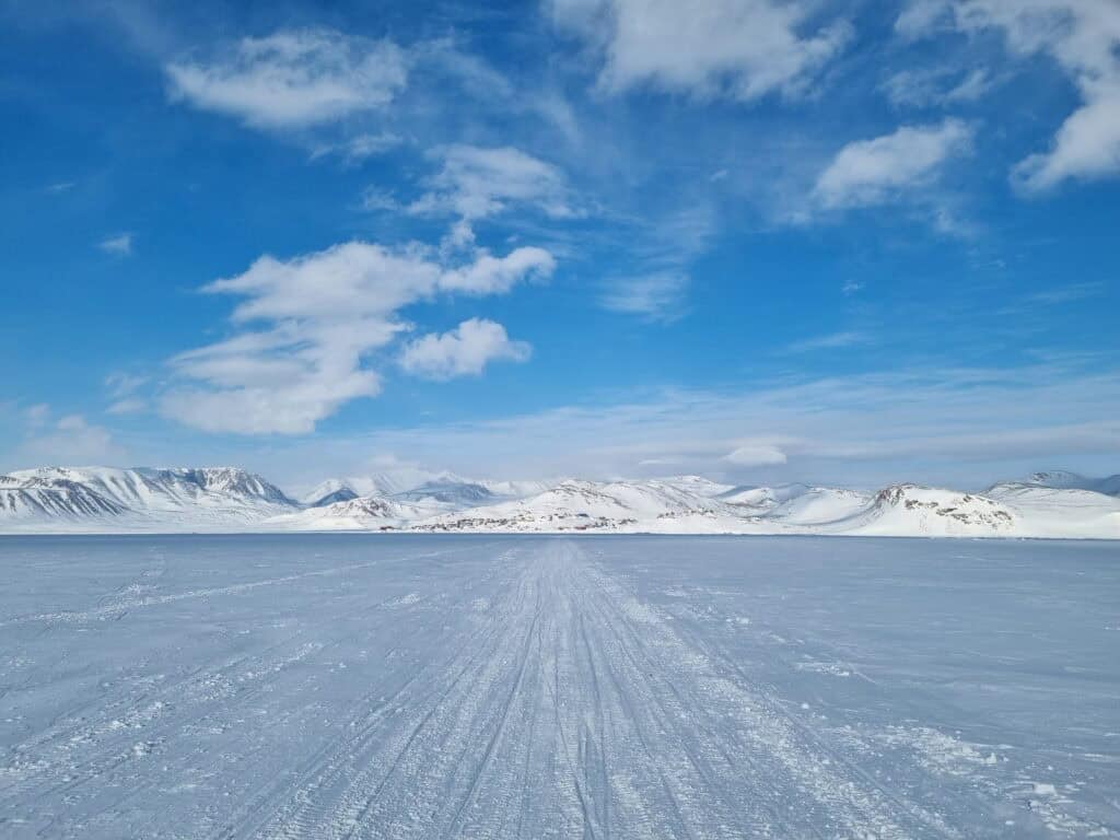 Ittoqqortoormiit from a distance during winter. Photo by Charlotte Pike