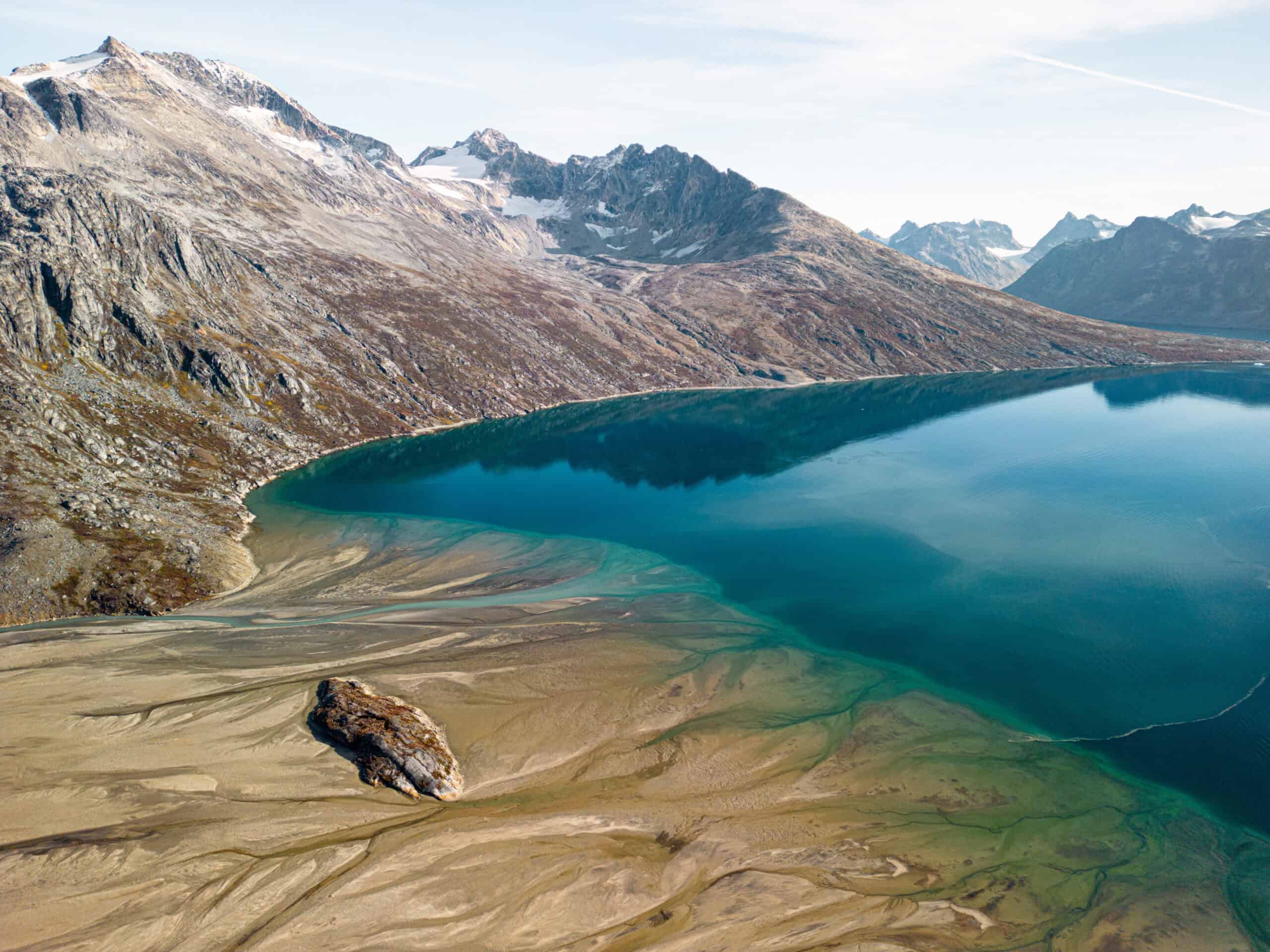 Mesmerizing blue water landscape in East Greenland.