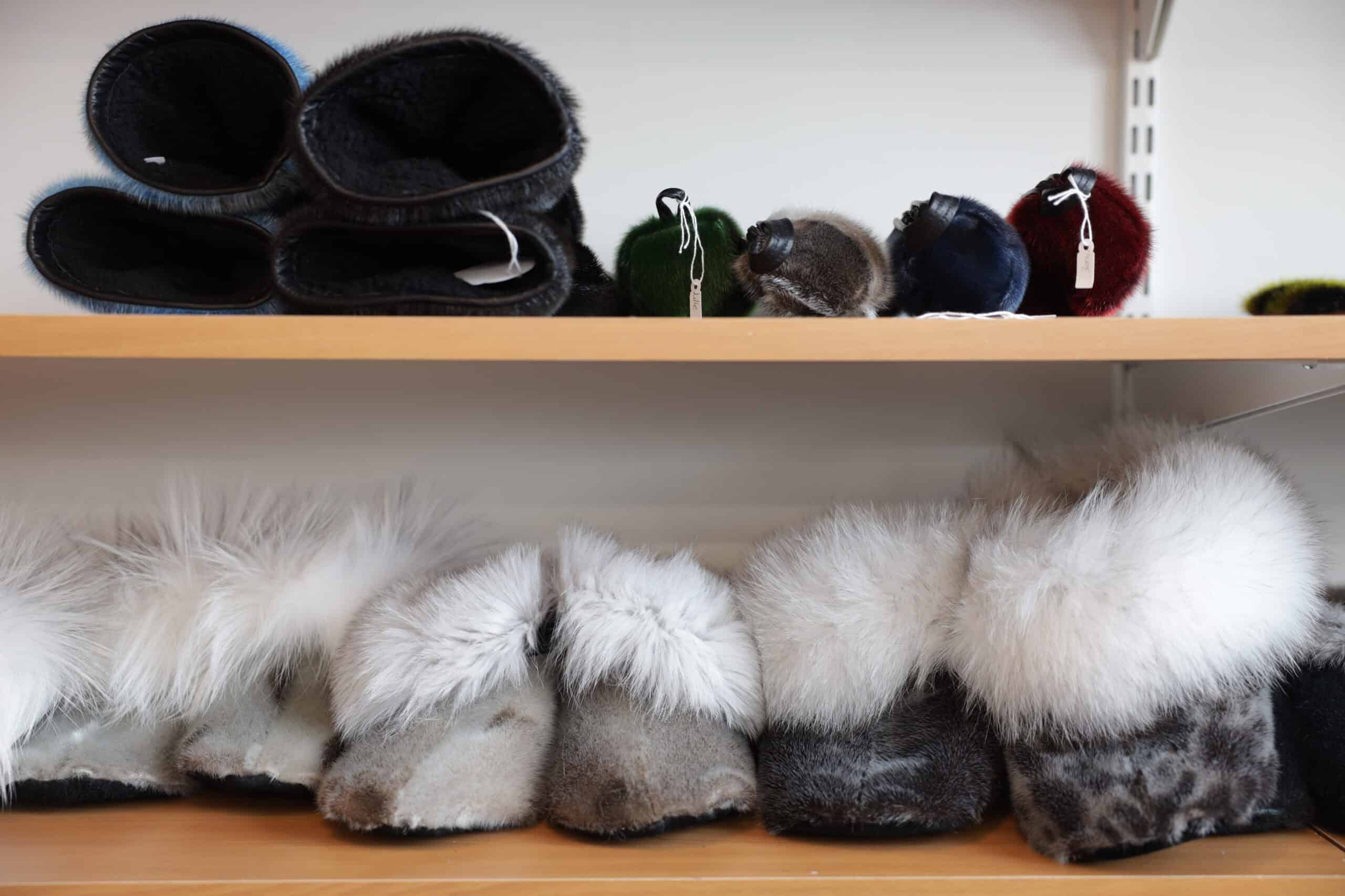 Handmade sealskin gloves, pencil case and slippers.