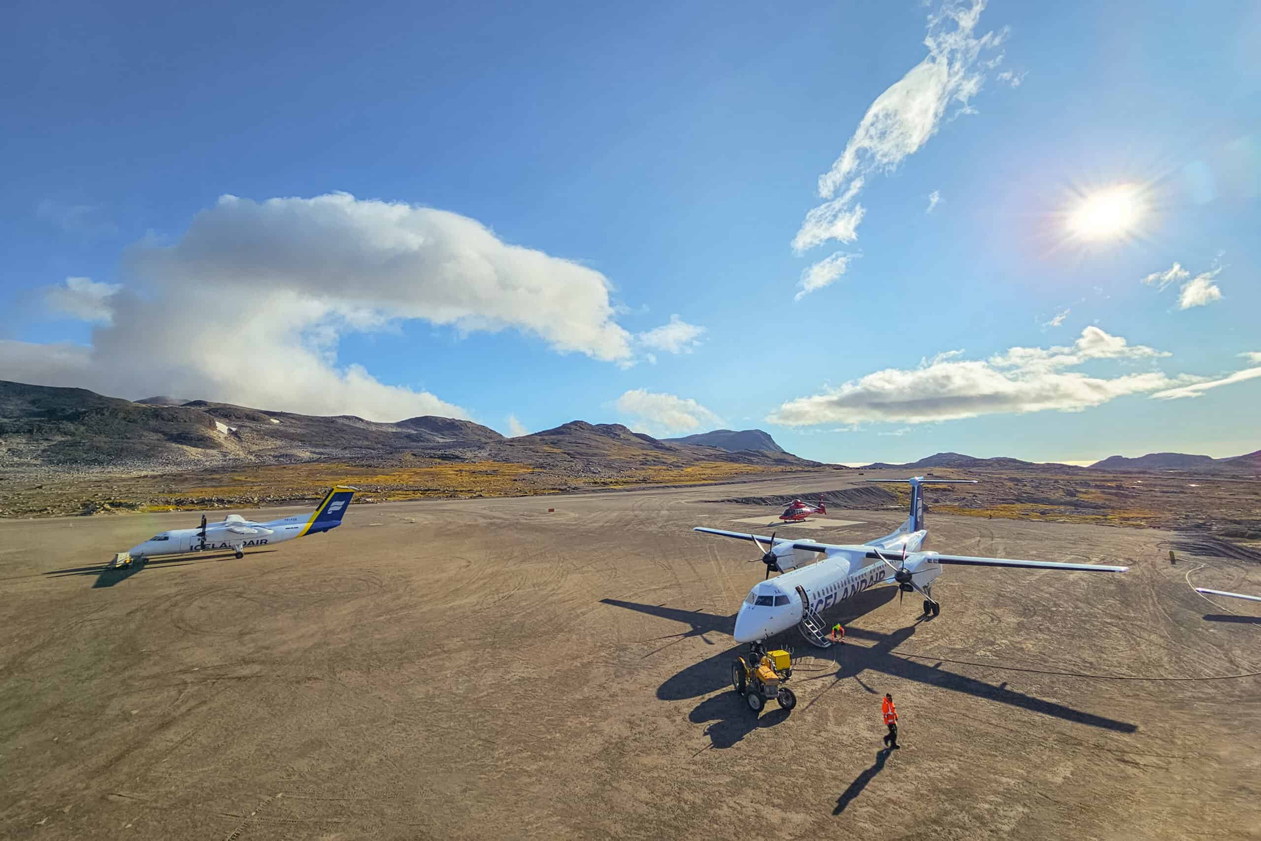 View from the airport tower in Kulusuk with two Icelandair aircrafts refueling before departure