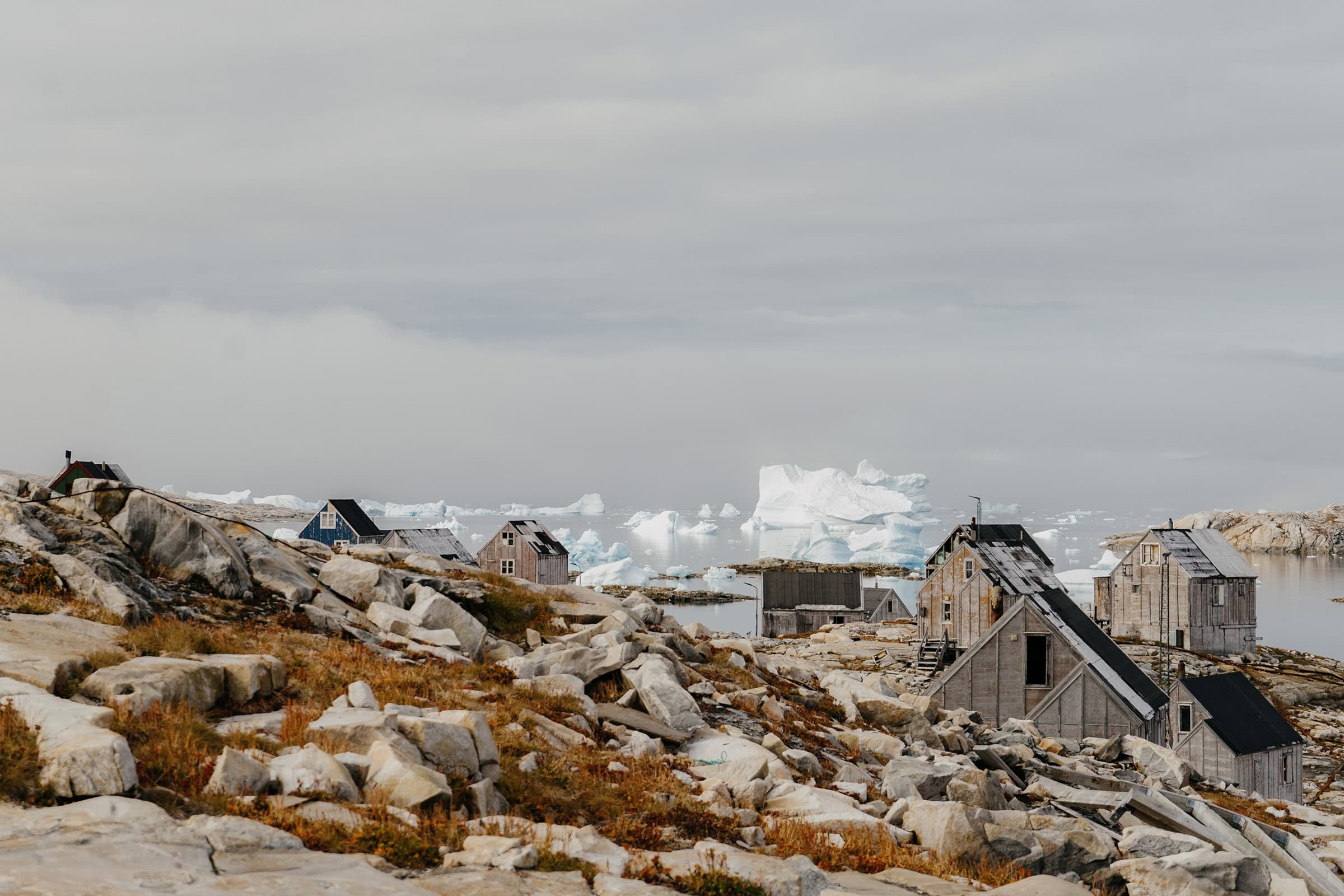 View towards big icebergs floating just outside of the settlement.