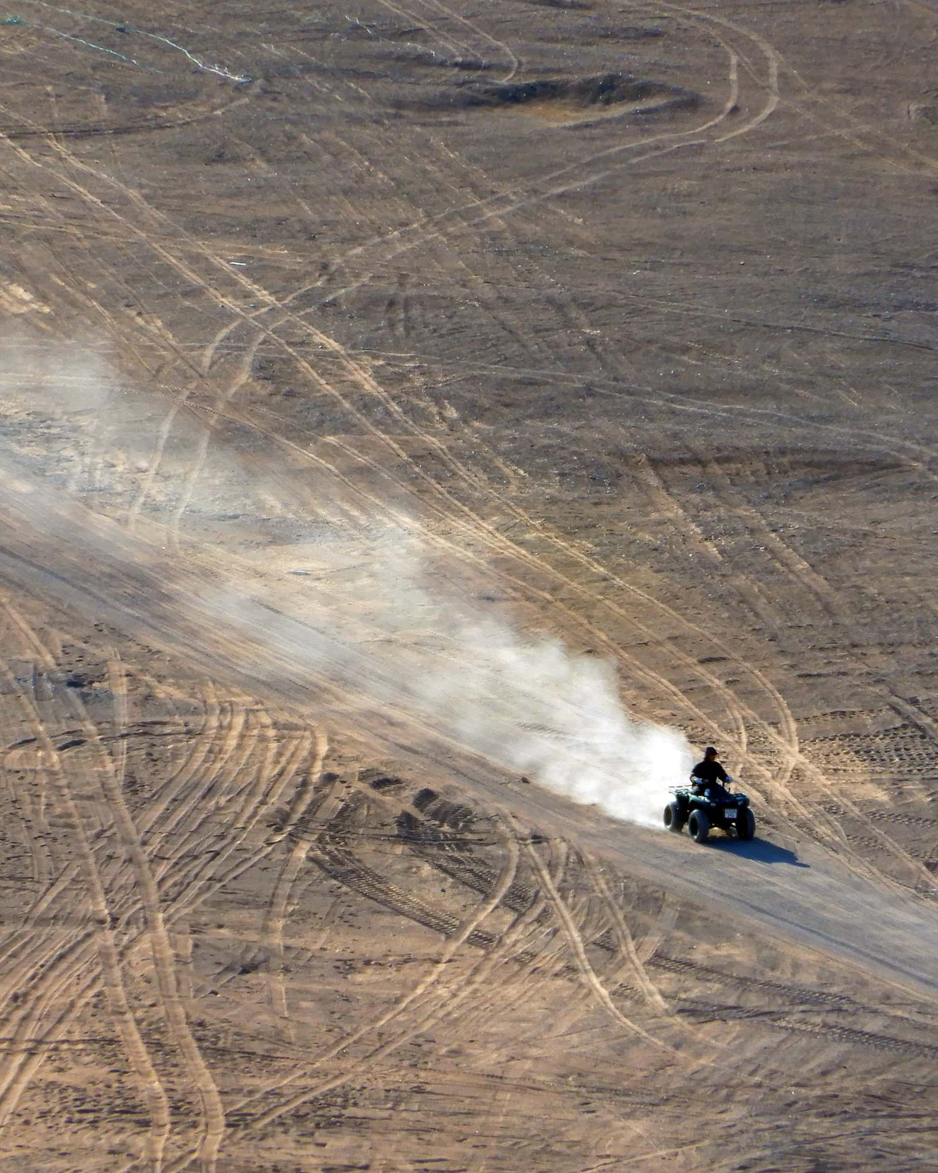 In summer, when the sea ice breaks and the dogs rest, residents of Ittoqqortoormiit move by quad bike across the tundra.