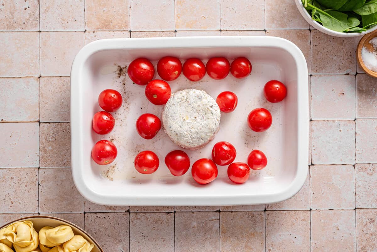 this shows the boursin and tomatoes in a ceramic pan 