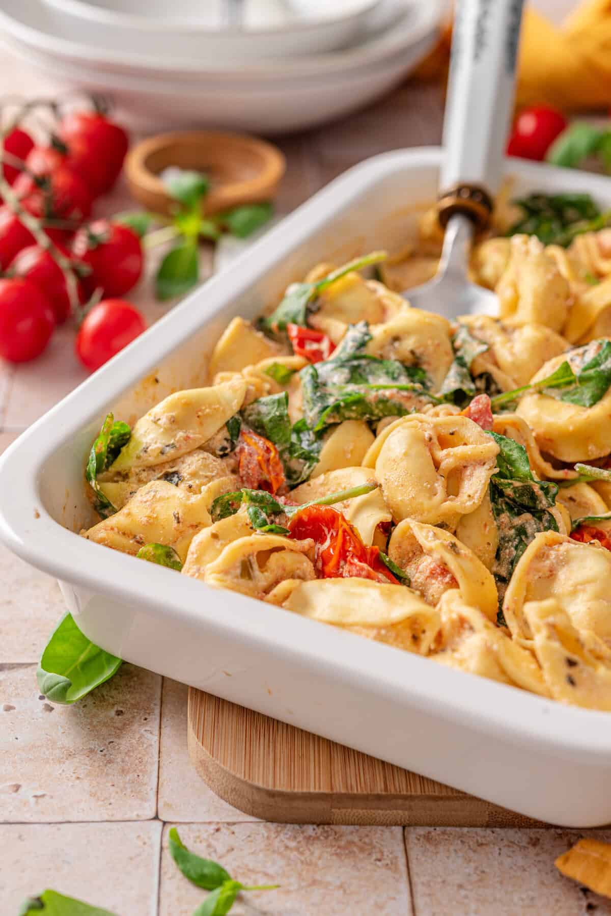 this is a side view close up of my tortellini bake with boursin and tomato 