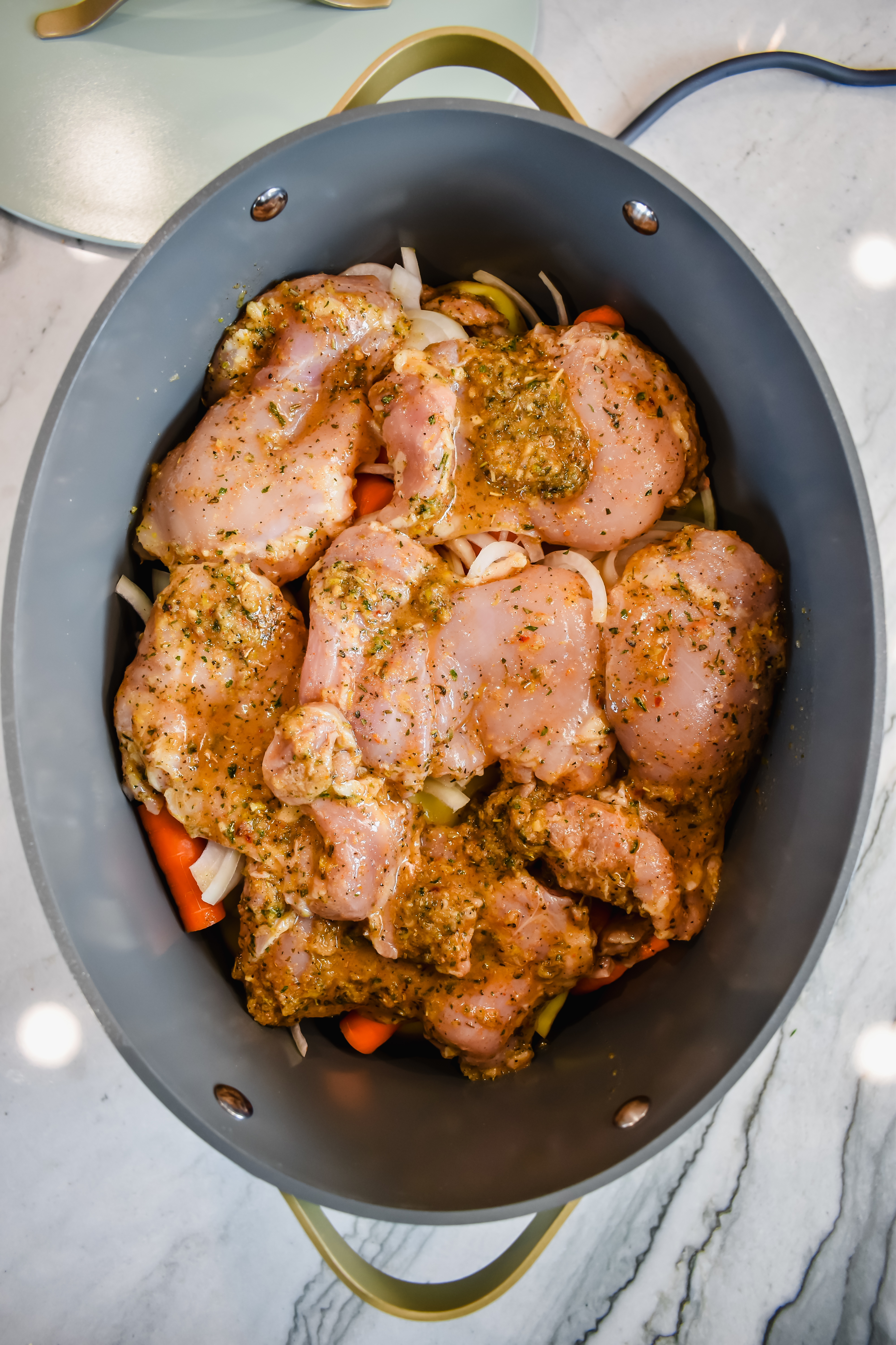 this is a top view of my lemon herb chicken in the slow cooker before it was cooked. 