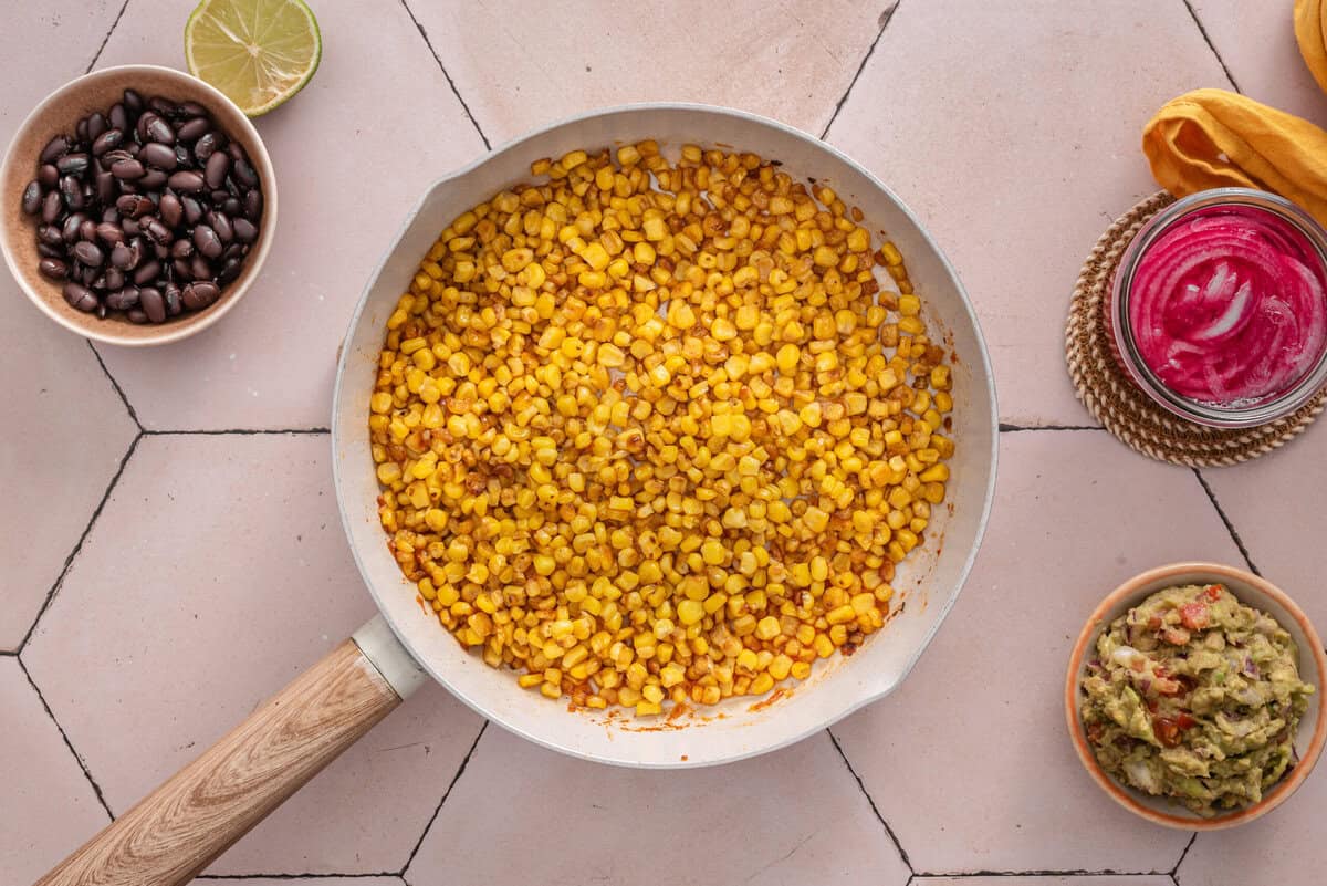 this shows me heating the roasted corn through