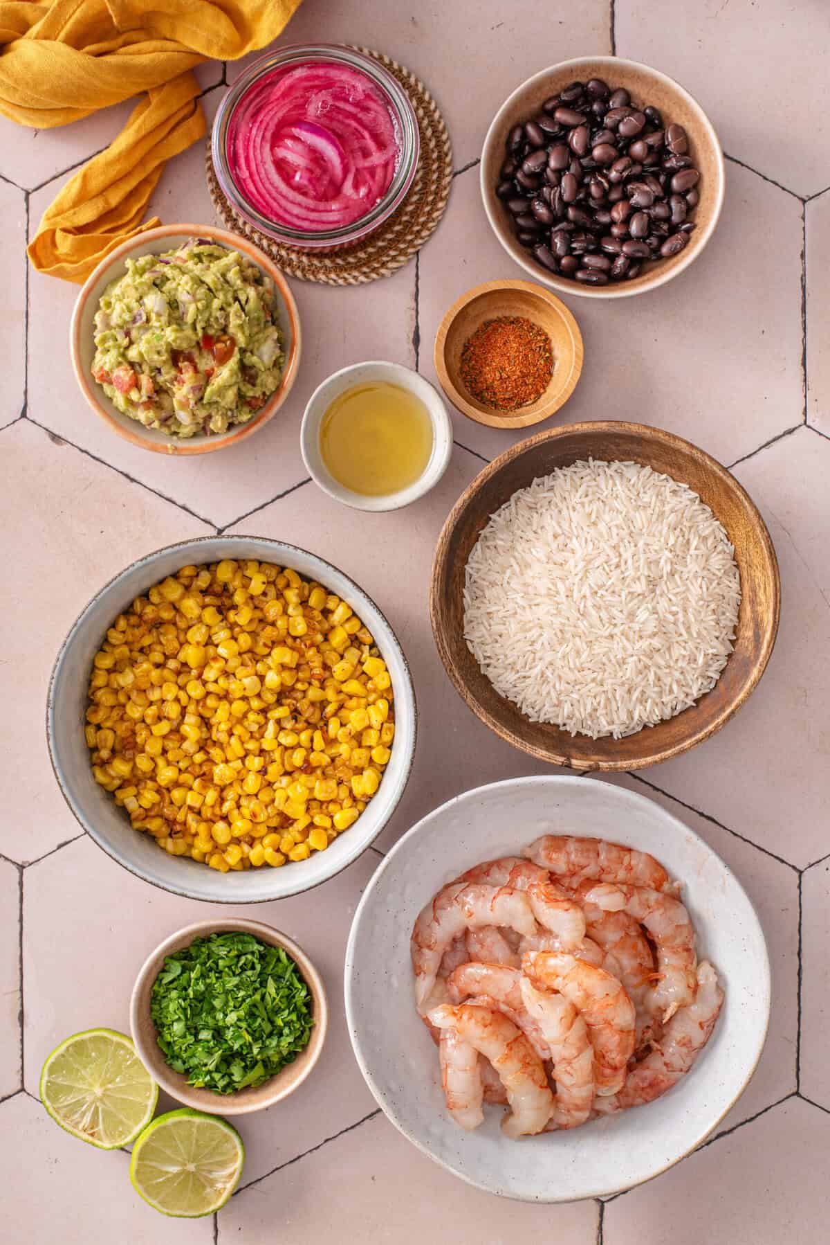 this is a top view of all of my ingredients needed to make my chili lime shrimp bowls