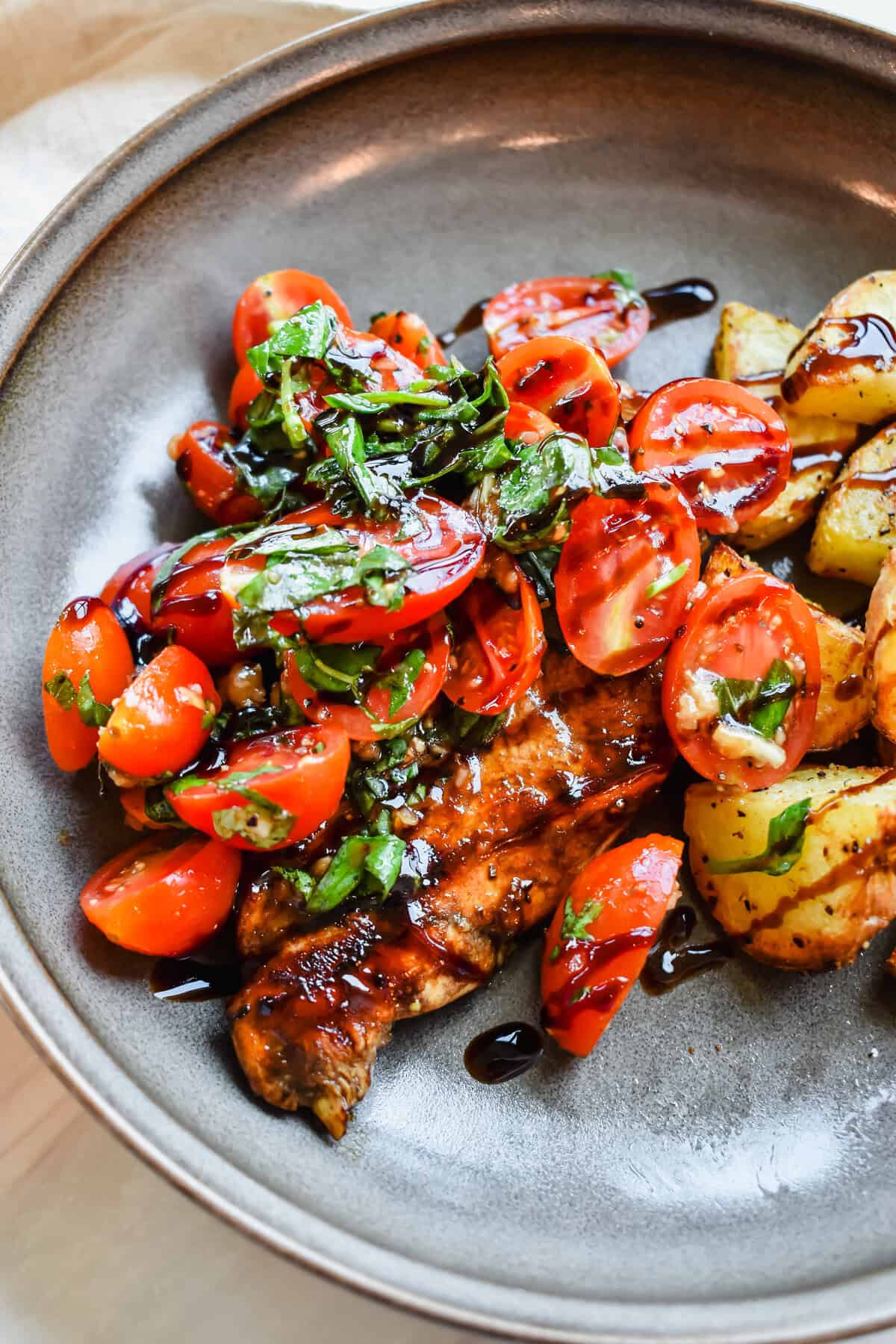 this is a side view close up of my easy and healthy bruschetta chicken recipe 