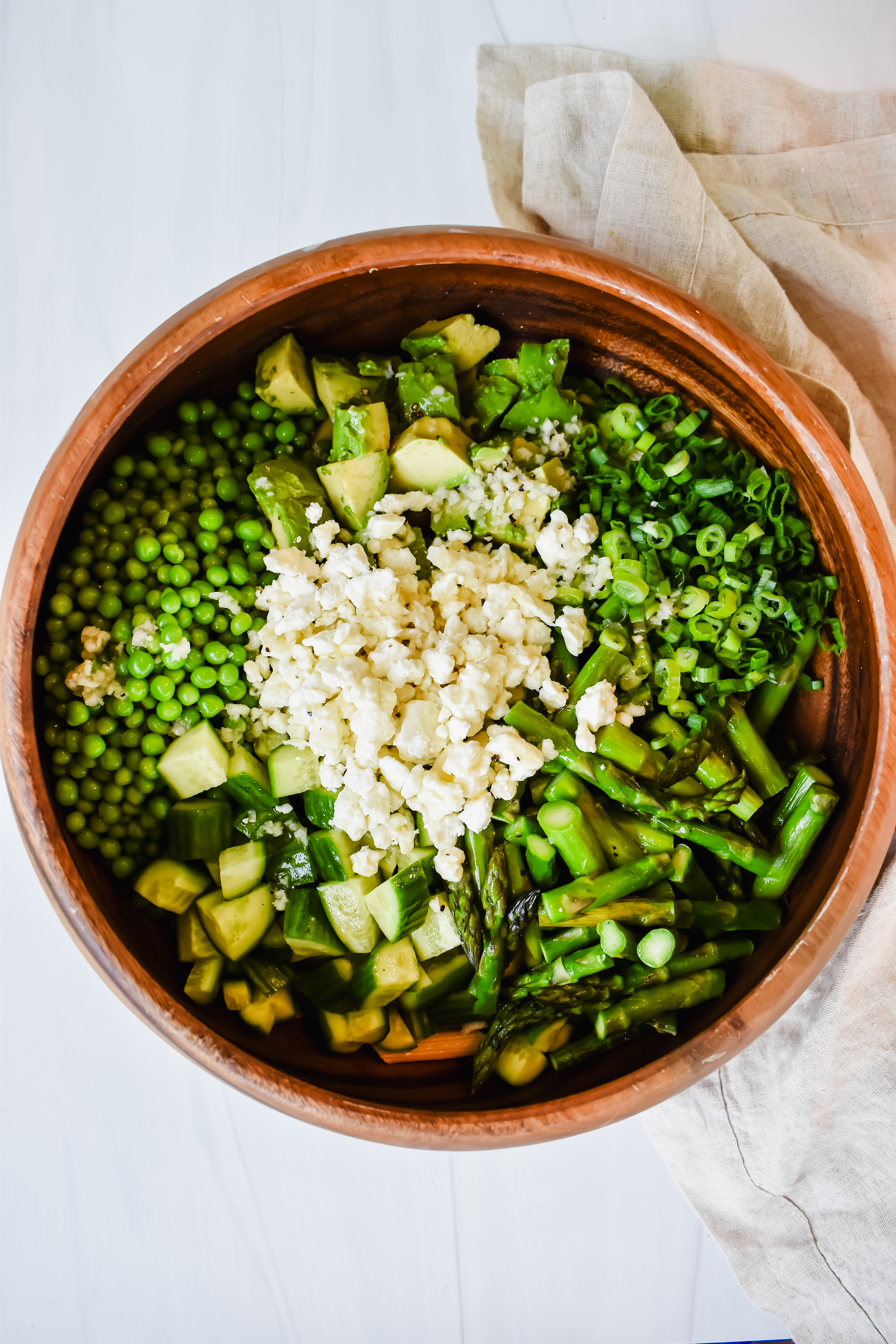 this is a top view of my Summer Asparagus Pea Pasta Salad unmixed.
