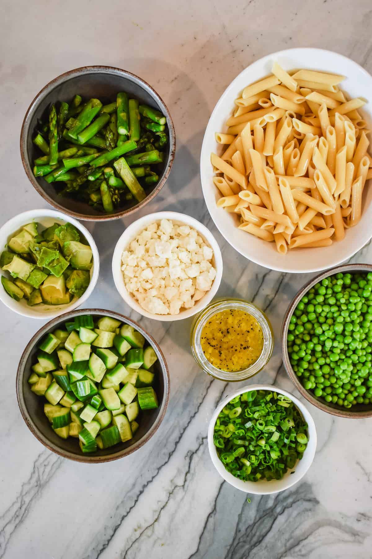 this is all the ingredients that you need to make my Summer Asparagus Pea Pasta Salad