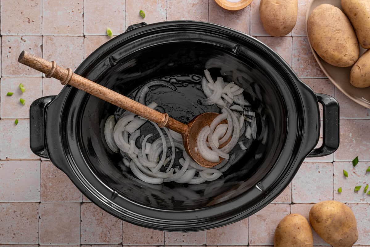 this shows me sauteeing the onions in my crock pot