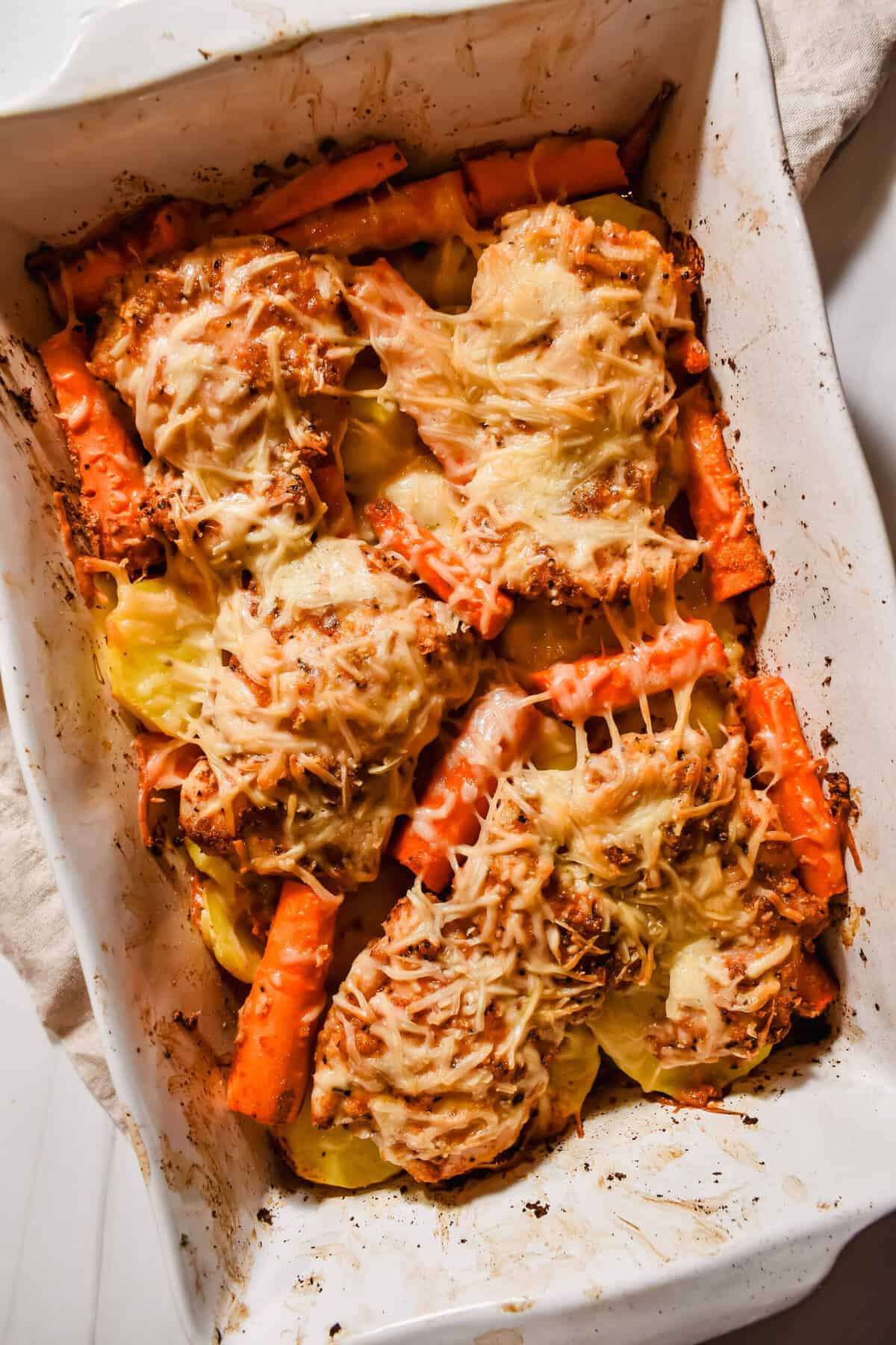 this is an overhead view of my one pan garlic parmesan chicken and potatoes with carrots bake. 