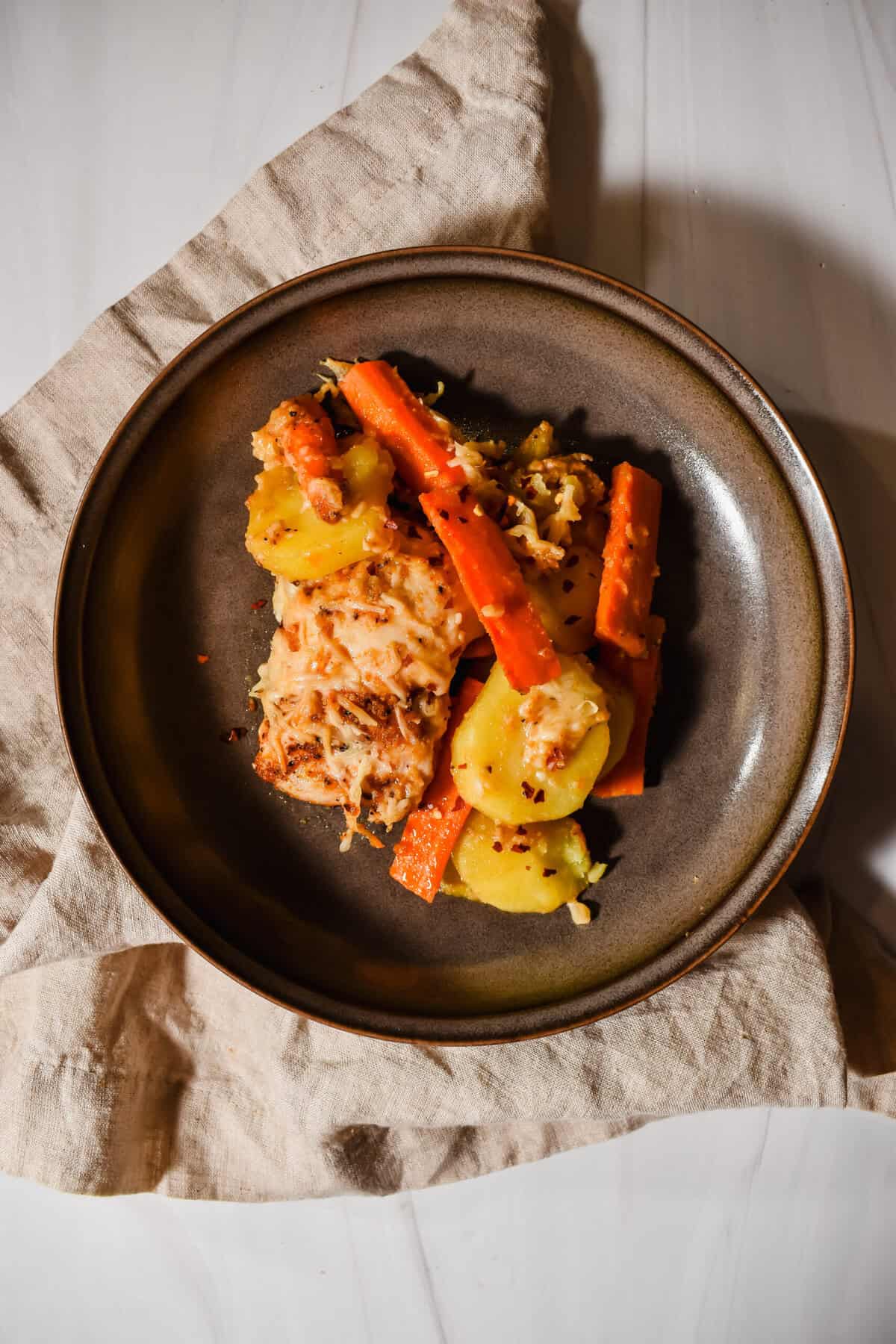 this is a zoomed out picture of a serving of my chicken and potatoes 