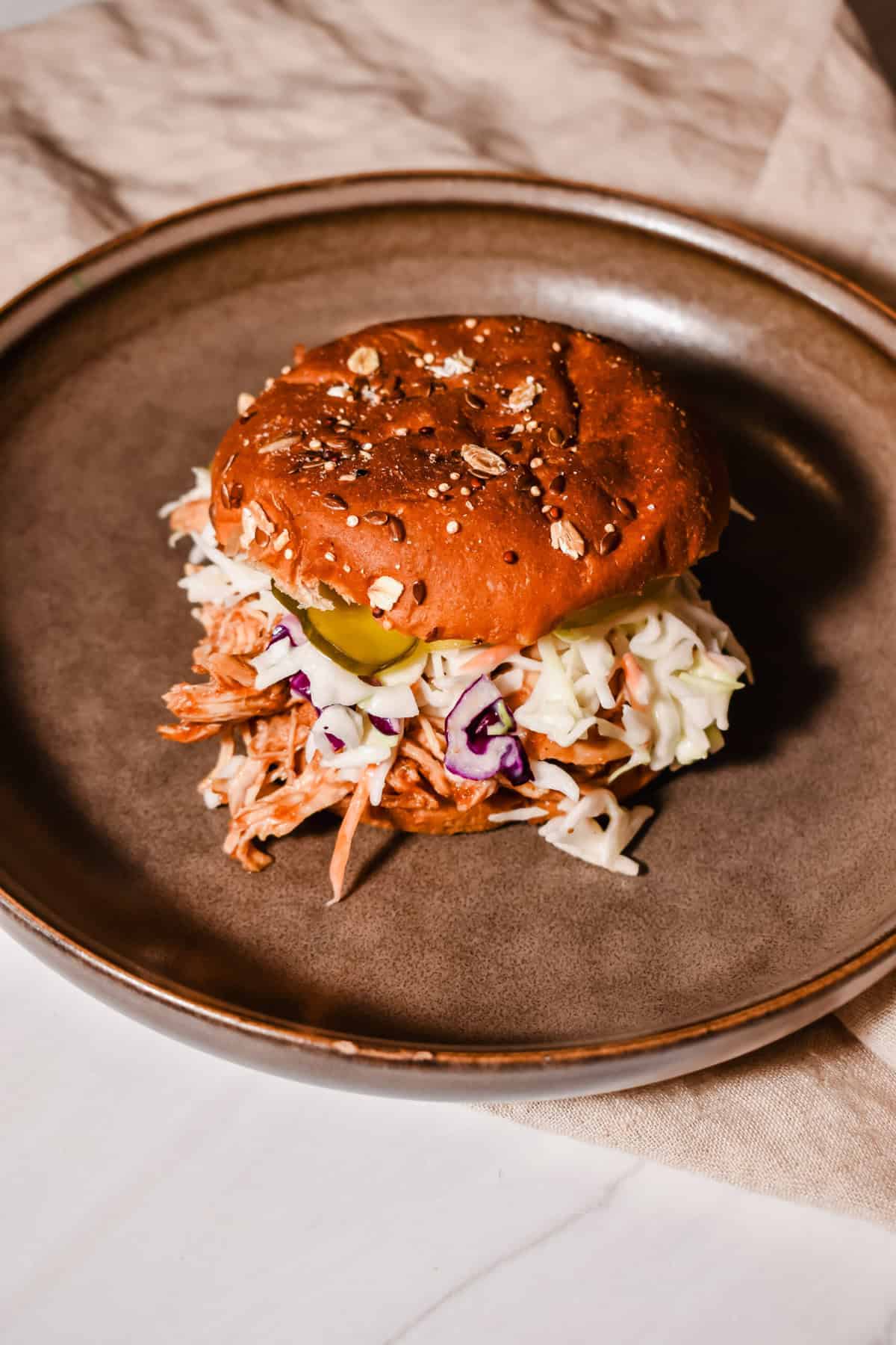this is a photo of one of my bbq chicken slow cooker sandwiches in a bowl.