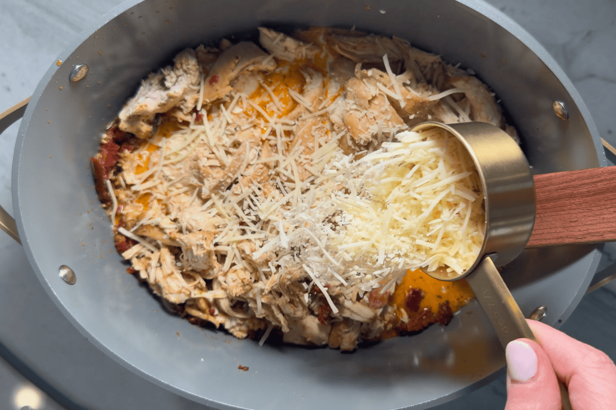 Adding in half and Half and cheese to make creamy sauce.