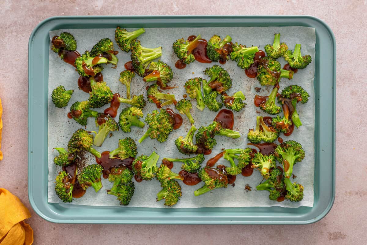 this shows me adding the teriyaki sauce onto the broccoli after cooking