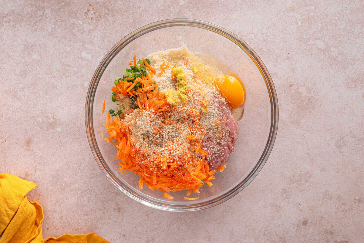 this shows me adding all of the ingredients into a bowl 