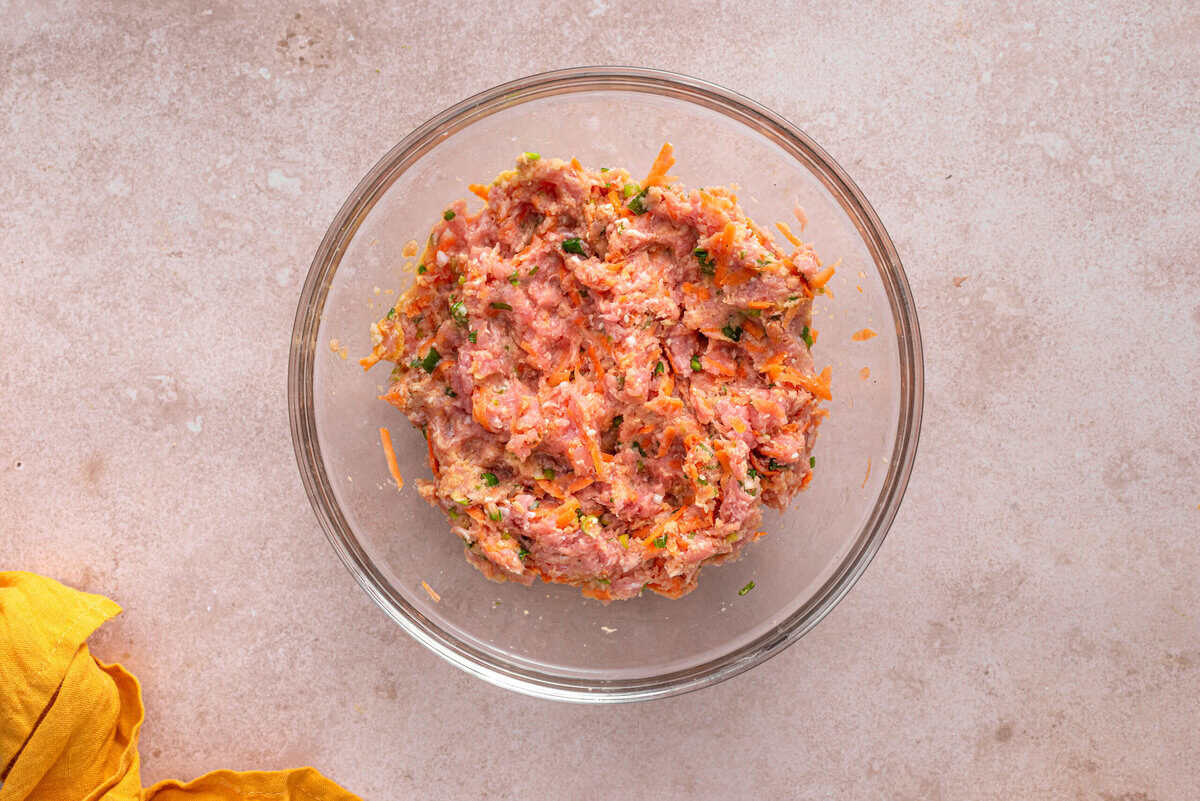 this shows the meat mixture being mixed. 