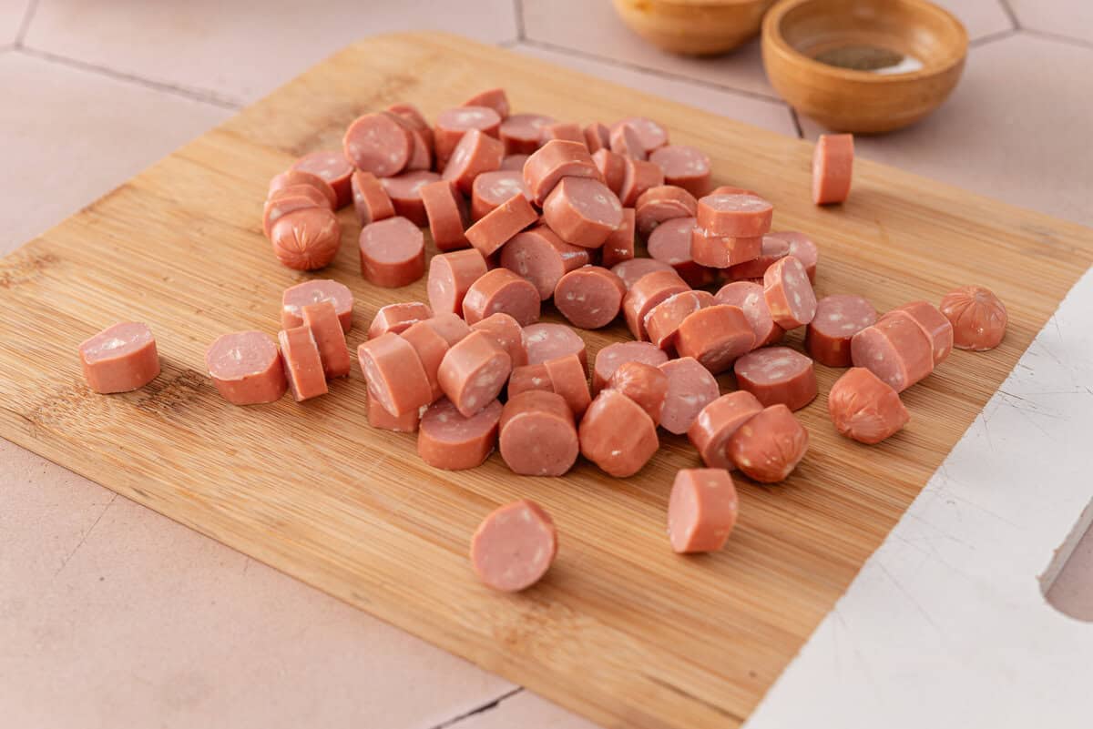 shows me slicing the sausage