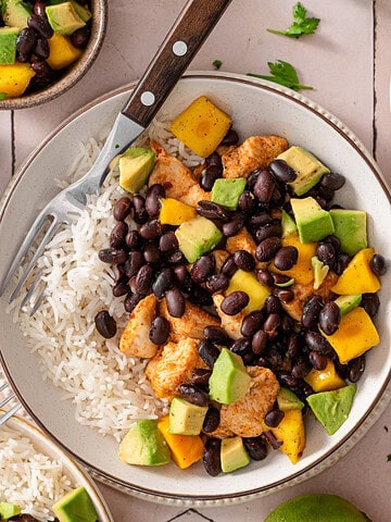 Honey lime chicken bowls with rice and mango salsa.