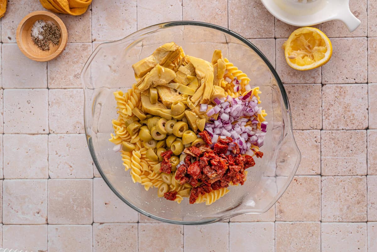 Overhead shot of all the ingredients together for the tuscan pasta salad.