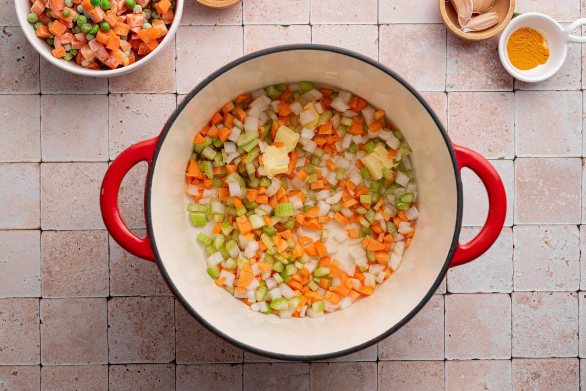 Overhead shot of vegetables in dutch oven.