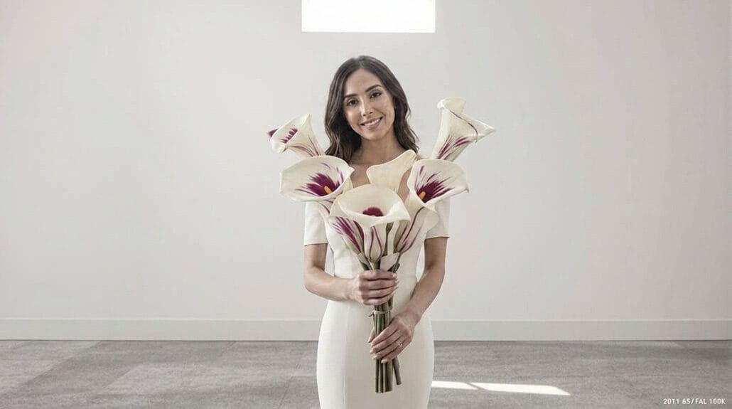 Bride holding a stunning bouquet of calla lilies at her wedding.
