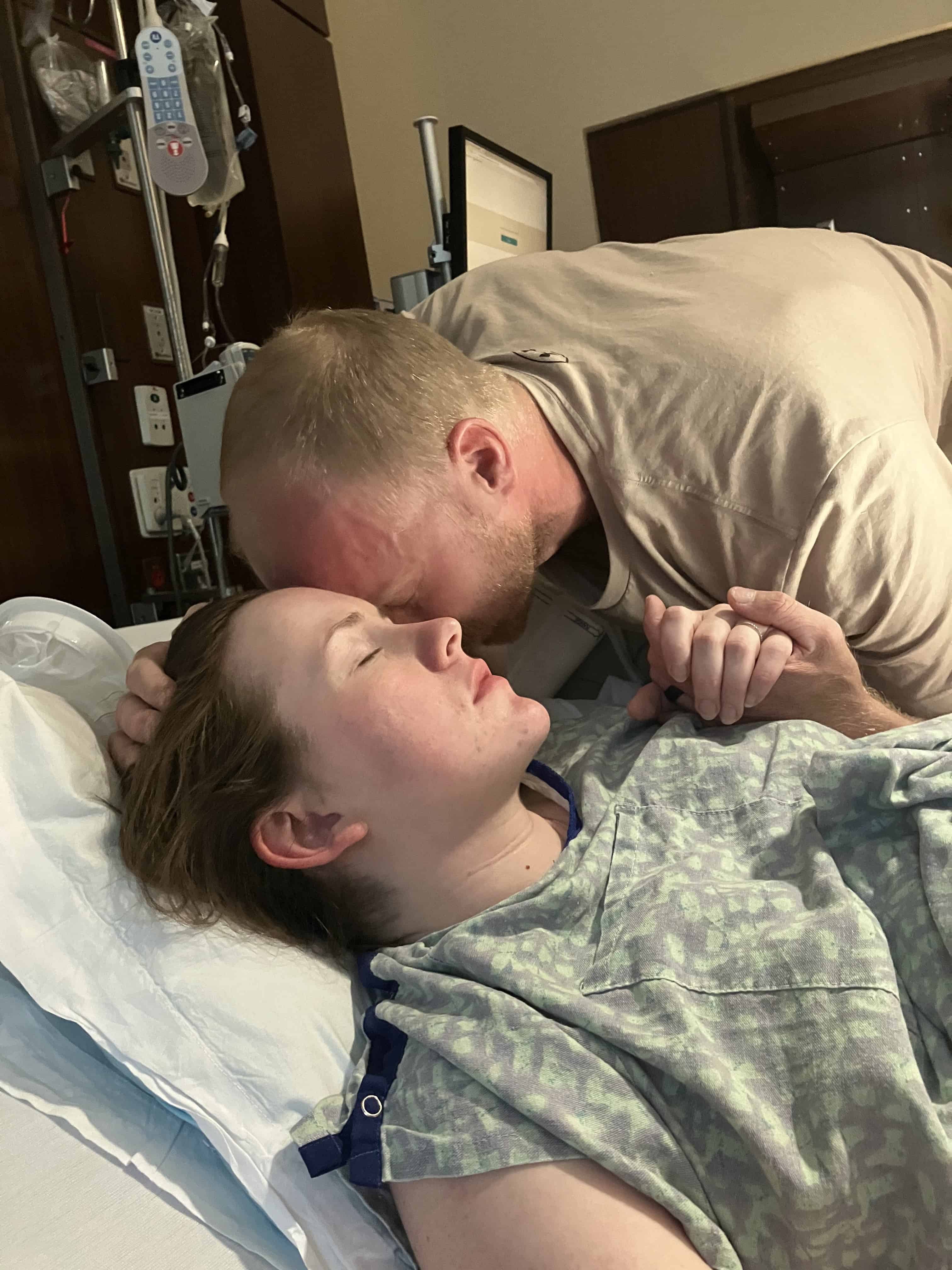 Claire in labor supported by her husband Daniel in a beautiful Orthodox Christian birth story