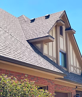 Gutter guards on seamless aluminum gutters in Dayton Ohio protecting a home with an asphalt shingle roof