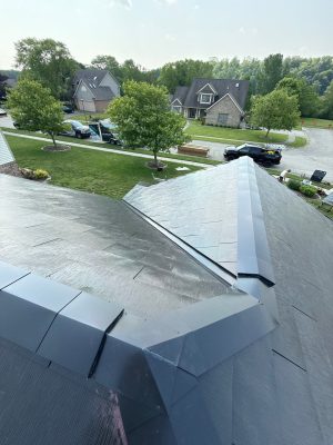 Quality Telsa roofing installation on a residential home with durable, weather-resistant materials for long-lasting protection.