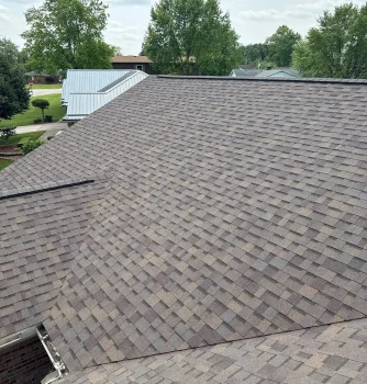 High-quality asphalt shingle roof with durable roofing materials, showcasing professional roofing services offered by Elevated Roofing and Siding.