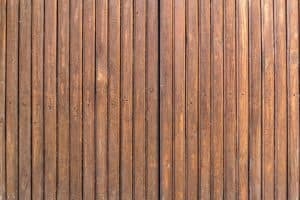 Close-up of wooden garden fence panels for privacy and security.