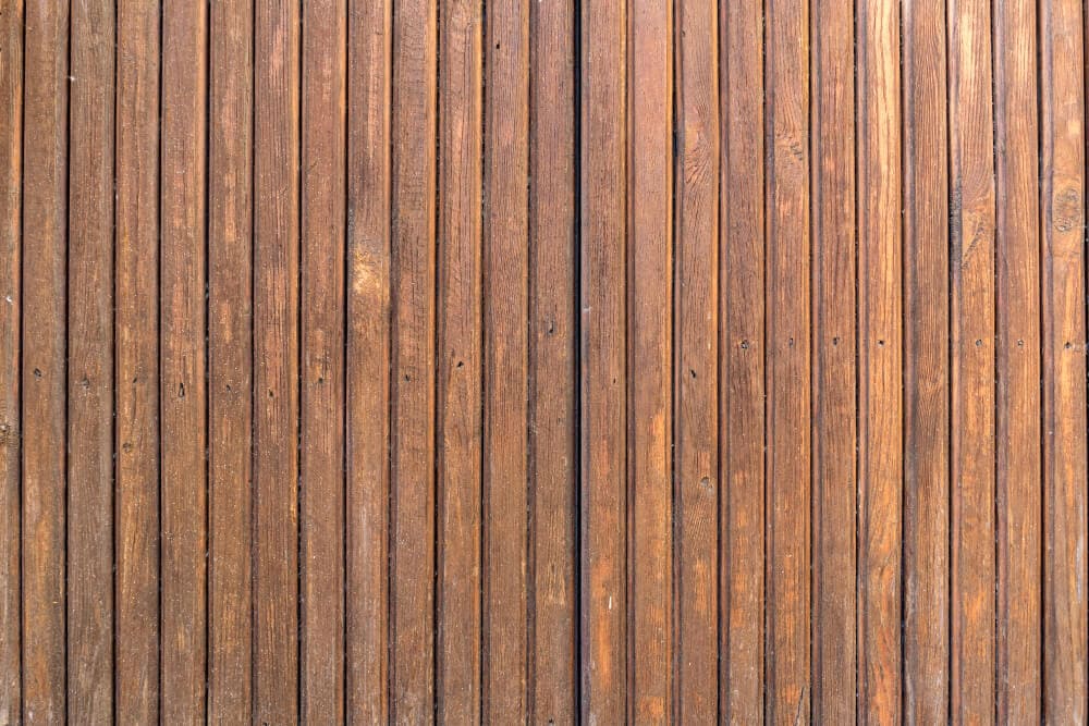 Close-up of wooden garden fence panels for privacy and security.